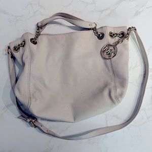 Michael Kors Leather purse. Cross body or tote straps.